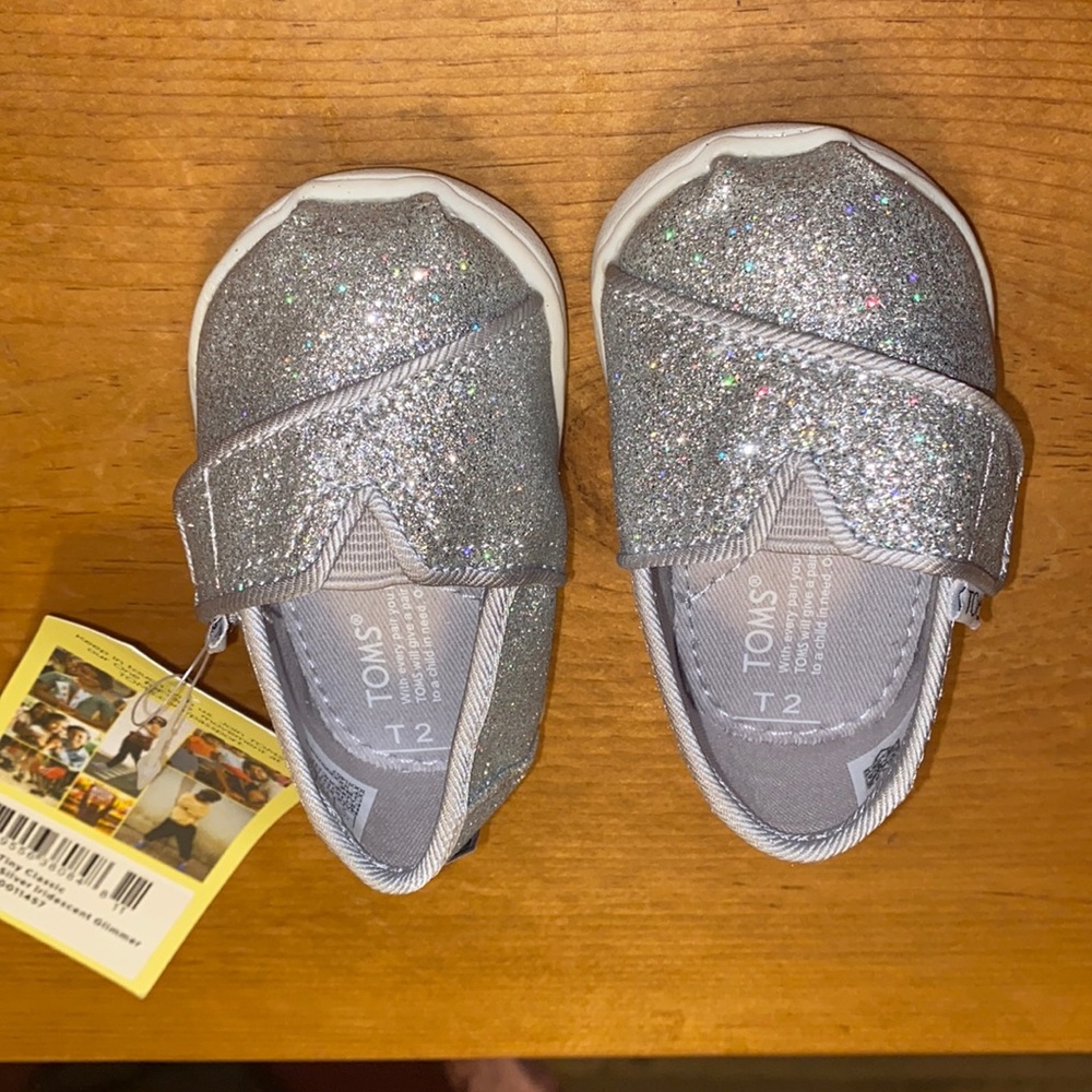 NIB TOMS Silver glitter tiny alpargata baby size 2